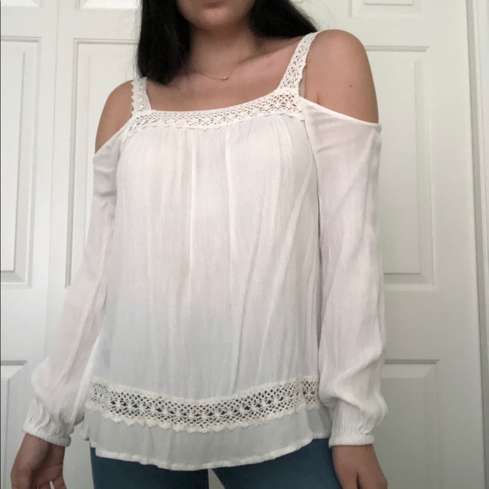 white shoulderless shirt